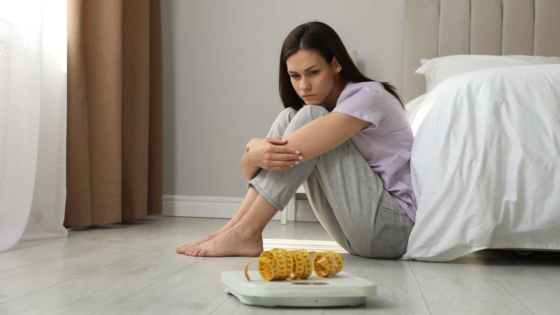  Unspecified Feeding or Eating Disorder UFED Treatment at Virtue Recovery Center Woman and a Scale